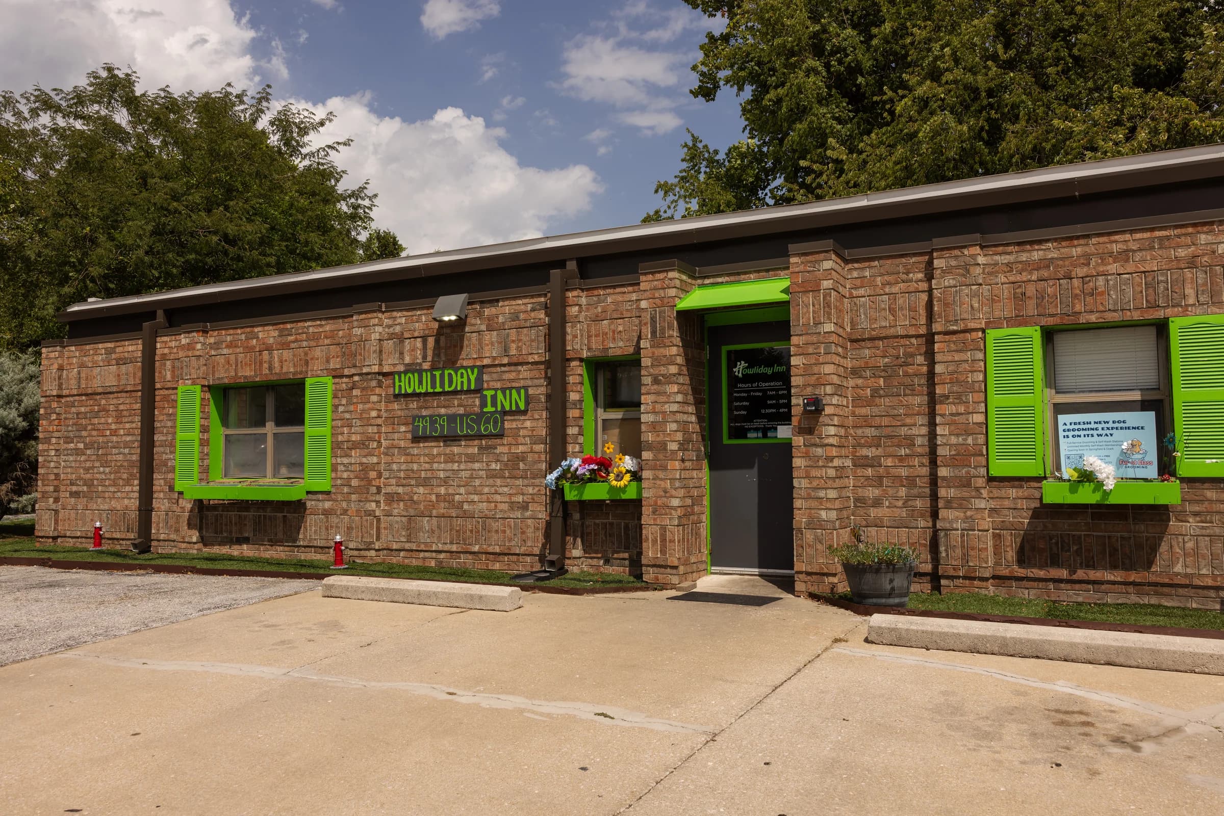 The exterior of Howliday Pet Resort at 4939 US-60 in Rogersville, Missouri